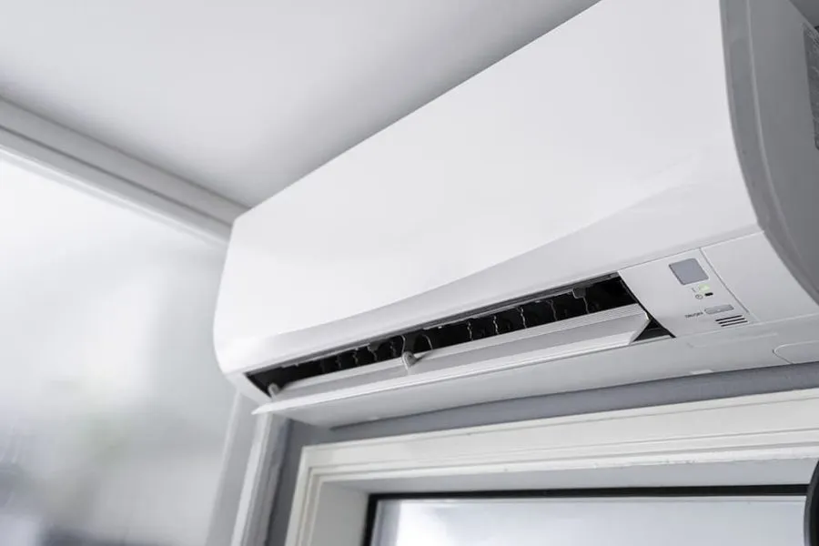 Ductless mini split system mounted on wall